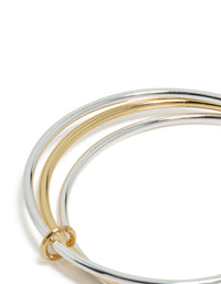 Explore mixed metal linked bangles featuring silver plated and gold plated design closure detail view - link has visual effect only