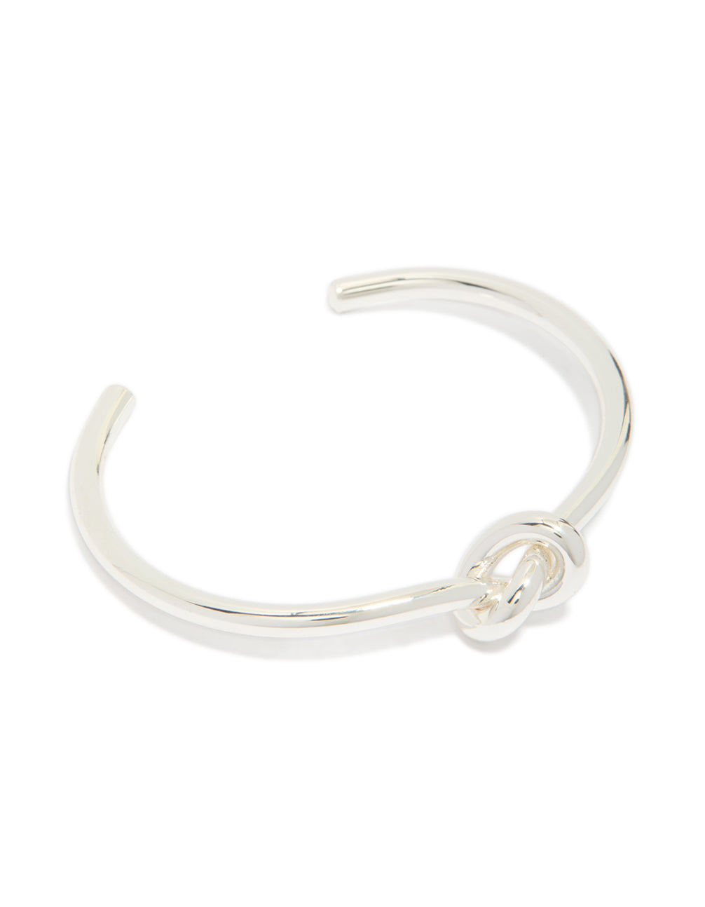 Showcasing a silver plated knotted wrist cuff featuring statement bangle design front view