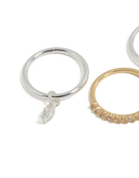 Discover a mixed metal plated organic cubic zirconia rings 4-pack featuring charm details in gold and silver close up view - link has visual effect only