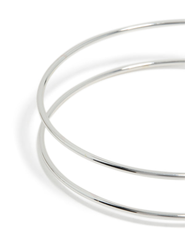 Highlighting the silver diamante thin wrap arm cuff bangle with polished metal finish closure detail view