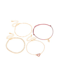 Featuring a 4-pack of burgundy cord bracelets cross and heart in gold front view - link has visual effect only