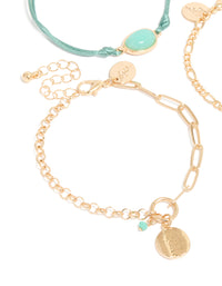 Showcasing a gold turquoise stone bangle and cord bracelets 4-pack with coin details close up view - link has visual effect only
