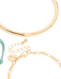 Highlighting a gold turquoise stone bangle and cord bracelets 4-pack with coin closure detail view - link has visual effect only