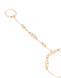 Elegant gold adjustable hand chain close up view - link has visual effect only