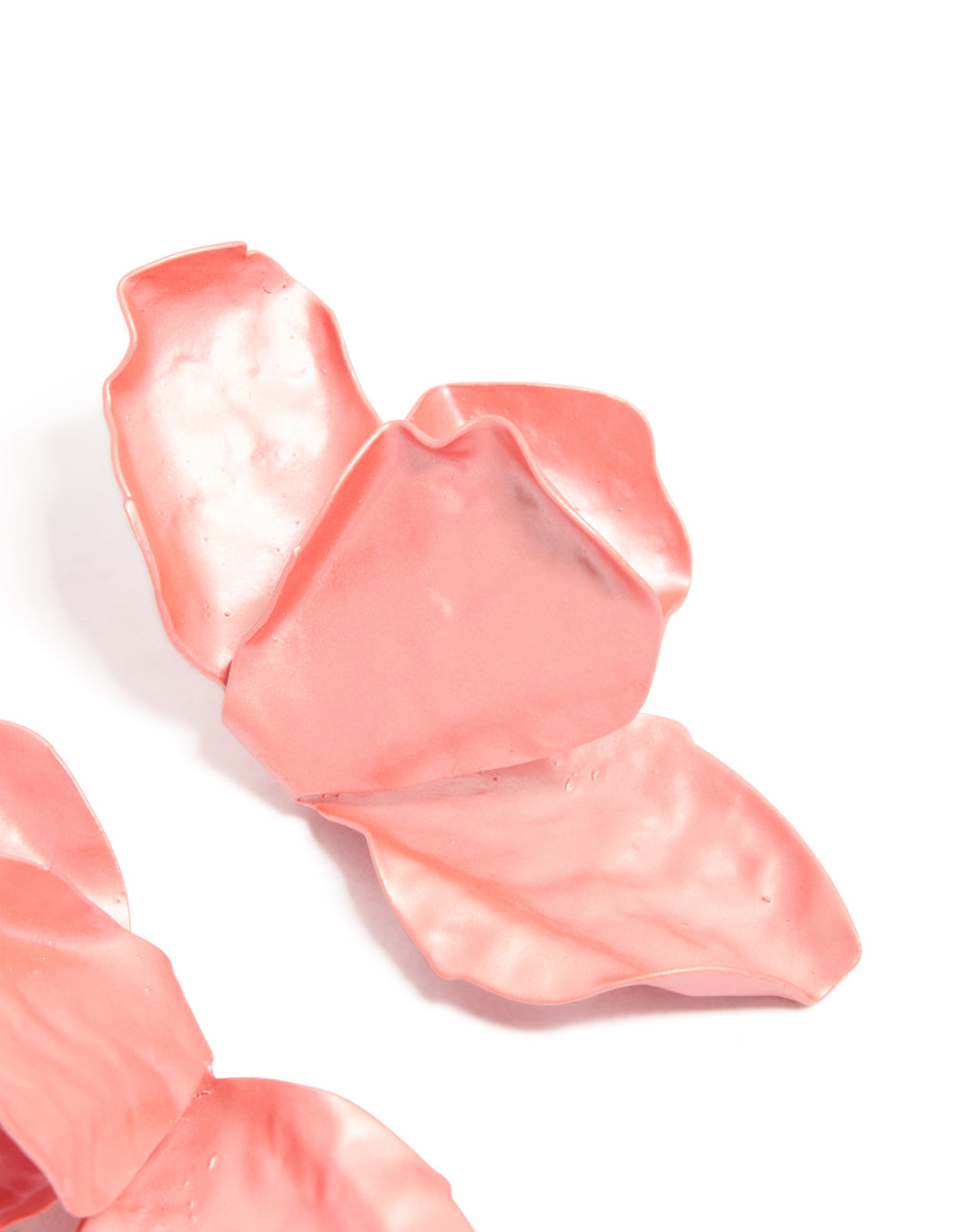 Beautifully crafted coated metal drop earrings featuring floral petal design in light pink and coral detail view