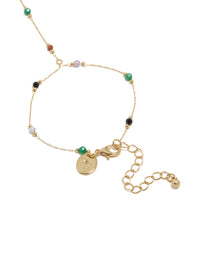 Displaying a gold plated multicoloured semi precious stone beaded hand chain in statement style closure detail view - link has visual effect only