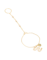 Featuring a gold plated pink cubic zirconia teardrop hand chain bracelet in statement style front view - link has visual effect only