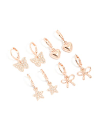Discover kids rose gold diamante pavé huggie earrings in a 4-pack featuring bow, celestial, heart, and butterfly designs front view - link has visual effect only