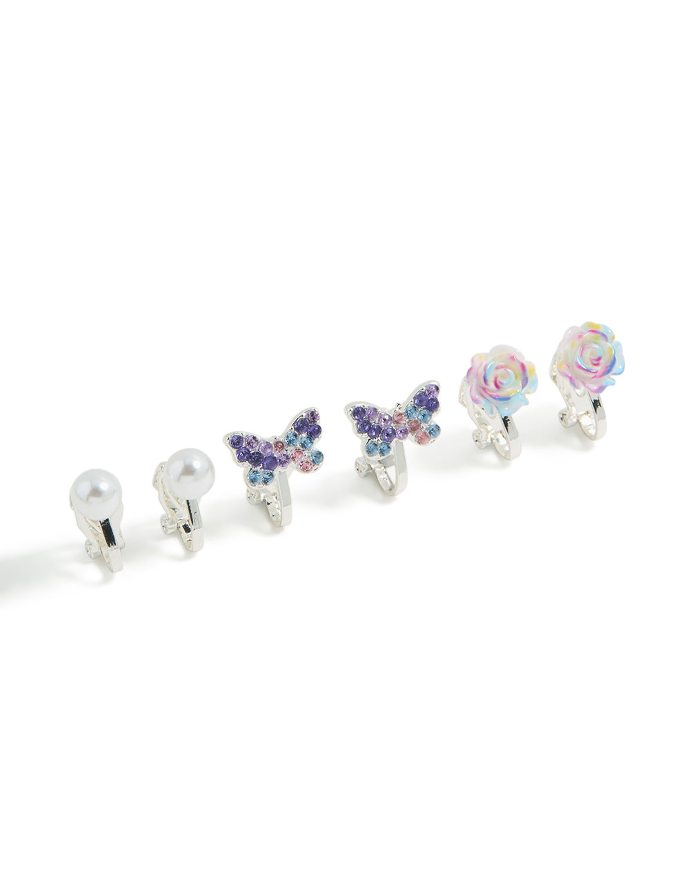 Crafted with clip-on style kids earrings in a 5-pack featuring butterfly, floral rose, heart, and pearl embellishments with silver plated ombre finish in lavender, light pink, and white close up view