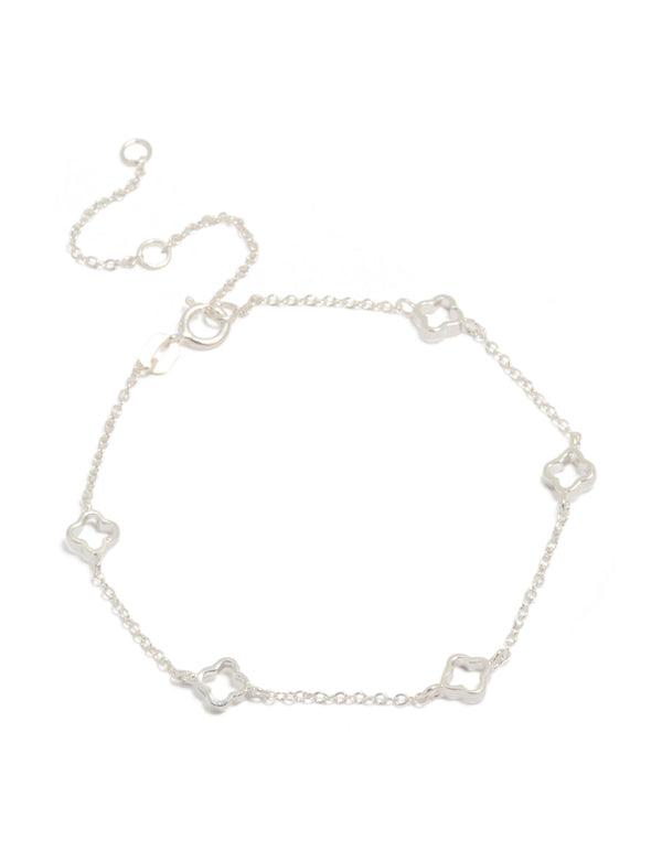 Featuring a sterling silver statement flower charms bracelet in silver front view