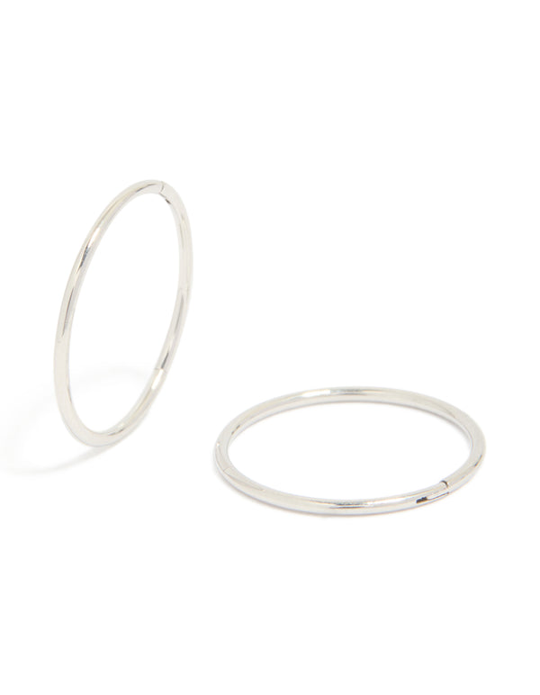 These surgical steel sleeper earrings in silver feature hoop closure front view