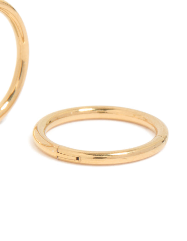 Highlighting gold plated surgical steel 8 MM thick sleeper earrings with hoop closure post detail view