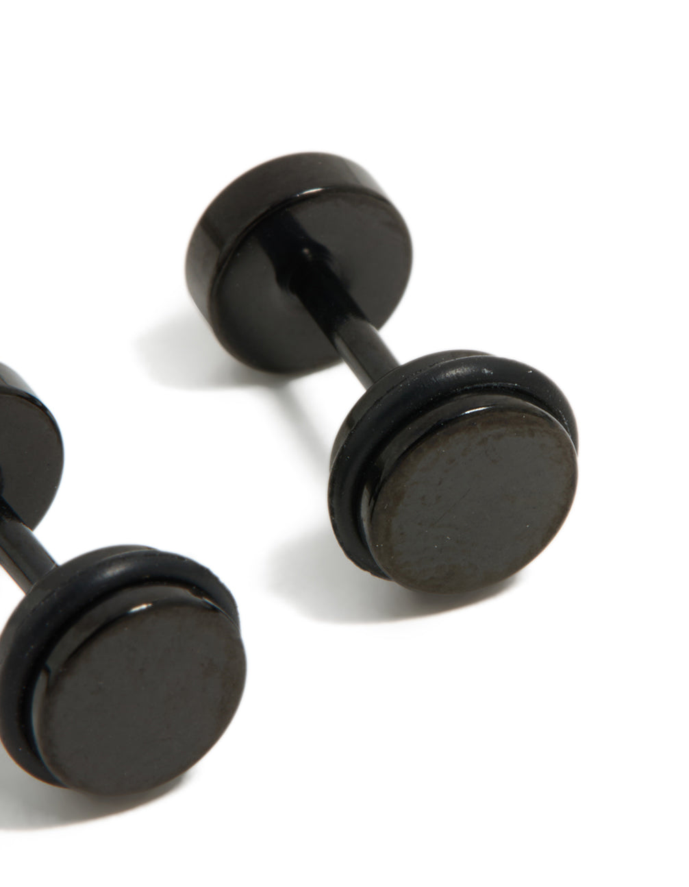 Displaying black coated surgical steel disc flat back studs with detailed construction post detail view