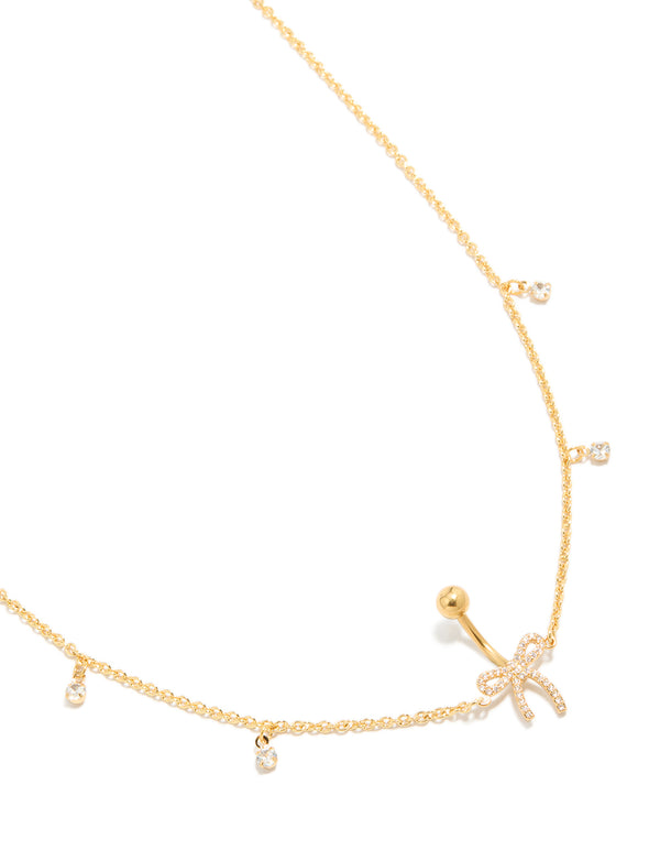 Featuring gold plated surgical steel cubic zirconia pavé bow chain belly bar with charm detail view
