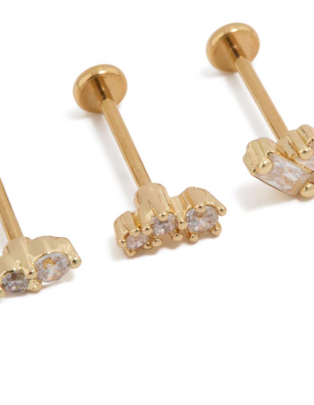 Designed with gold plated titanium and baguette cut cubic zirconia stones in a 3-pack featuring flat back closure close up view