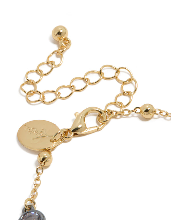Elegant mixed metal plated bracelet with cubic zirconia stone and ball chain closure detail view