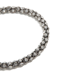 Showcasing a mixed metal plated diamante fireball chain bracelet with cubic zirconia in gold and silver close up view - link has visual effect only