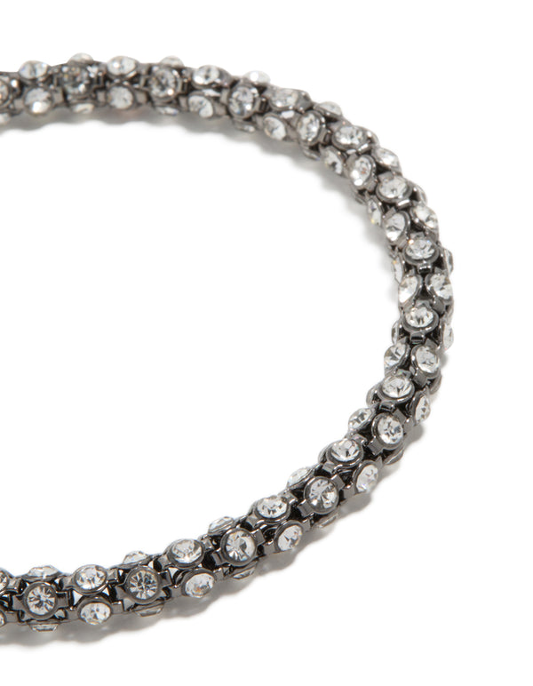 Showcasing a mixed metal plated diamante fireball chain bracelet with cubic zirconia in gold and silver close up view
