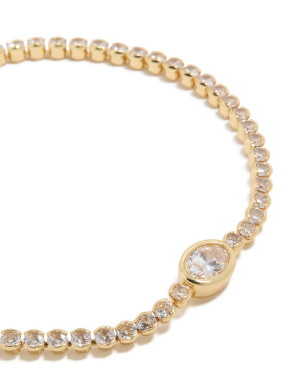 Crafted from gold plated material with oval cubic zirconia stones and close up view