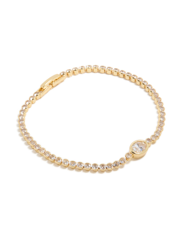 Showcasing a gold plated tennis bracelet featuring oval cubic zirconia stones detail front view