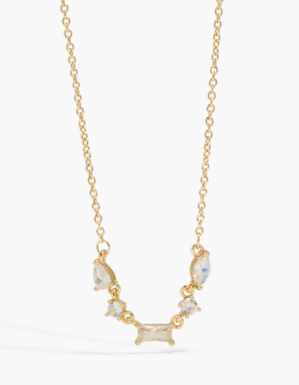 Explore this gold plated necklace featuring mixed shaped cubic zirconia front view