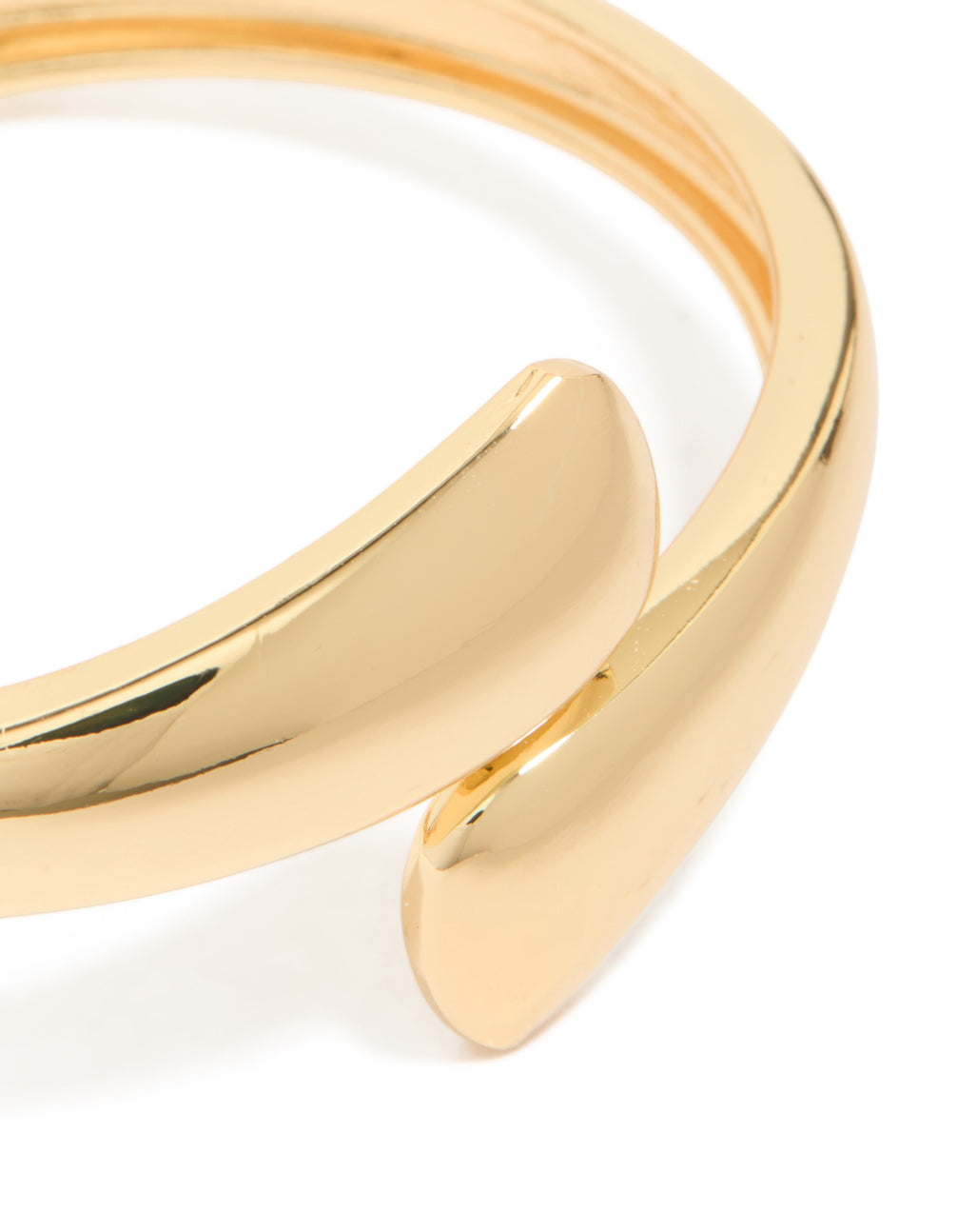 Detailed view of gold plated flat teardrop hinged bangle highlighting smooth finish and design close up view
