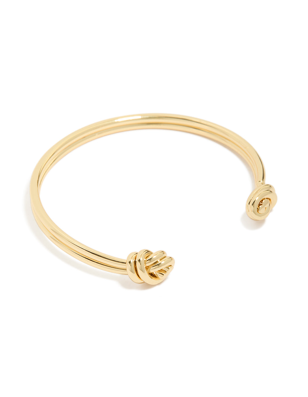 Showcasing a gold plated double knotted centre wrist cuff with dainty design front view