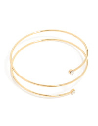 Featuring a gold plated diamante wrap around arm cuff with statement styling front view - link has visual effect only