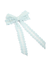 Crafted from floral fabric with bow design in powder blue, this hair clip features scalloped edge detailing, front view - link has visual effect only