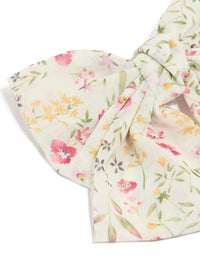 Designed with a bow clip featuring floral print with leaf accents in ivory, pink, light goldenrod yellow, and olive detail view - link has visual effect only