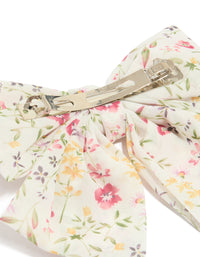 Crafted as a bow clip featuring floral print with leaf accents in ivory, pink, light goldenrod yellow, and olive side view - link has visual effect only
