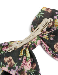 Featuring a large bow clip with printed flowers in black, pink, green, designed with statement style side view - link has visual effect only