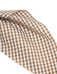 Crafted from checkered fabric in saddle brown and white scrunchie scarf detail view - link has visual effect only