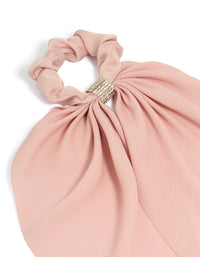 Crafted from light pink fabric, this diamante long scarf scrunchie features solid print with silver accents side view - link has visual effect only