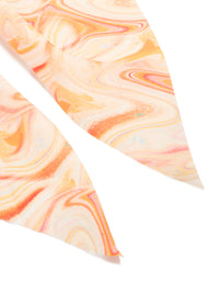 Crafted with an abstract print in peachpuff, darkorange, this orange marbled fabric scarf scrunchie makes a statement detail view - link has visual effect only