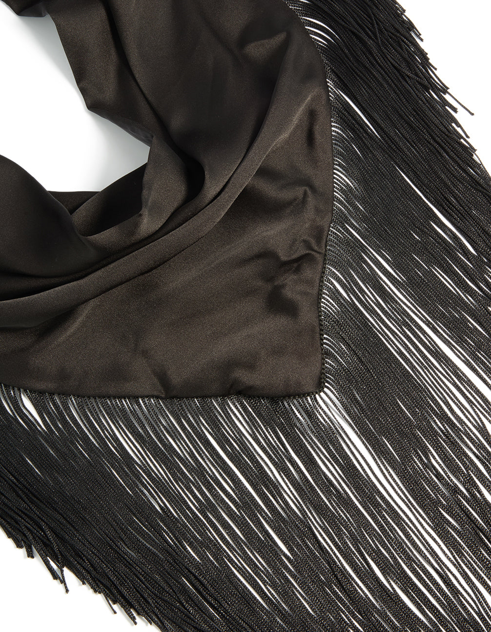 Elegant tassel fringe scarf in solid black fabric detail view