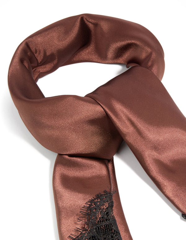 Crafted from chocolate brown fabric, this long scarf features solid print with black lace edge detail view