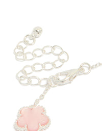 Highlighting the silver plated pink flower charms station bracelet with floral pattern in dainty style closure detail view - link has visual effect only