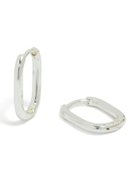 Showcasing waterproof silver plated stainless steel rectangle huggie earrings with huggie closure in silver front view - link has visual effect only