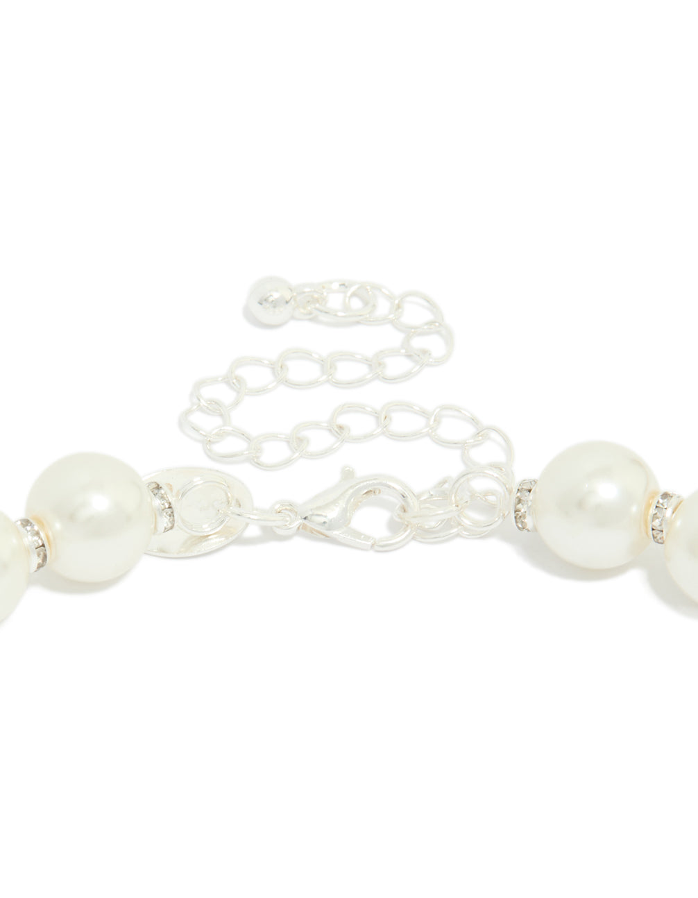 Detailed view of pearl necklace featuring silver plated diamante rondells and adjustable clasp detail view