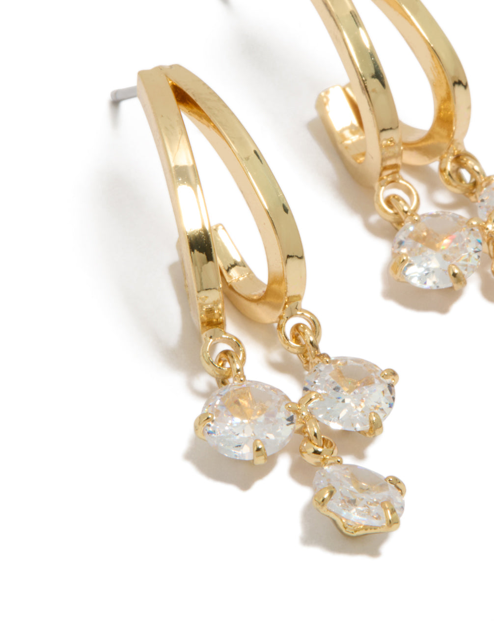Featuring gold plated cubic zirconia double drop hoop earrings with charm and closure close up view