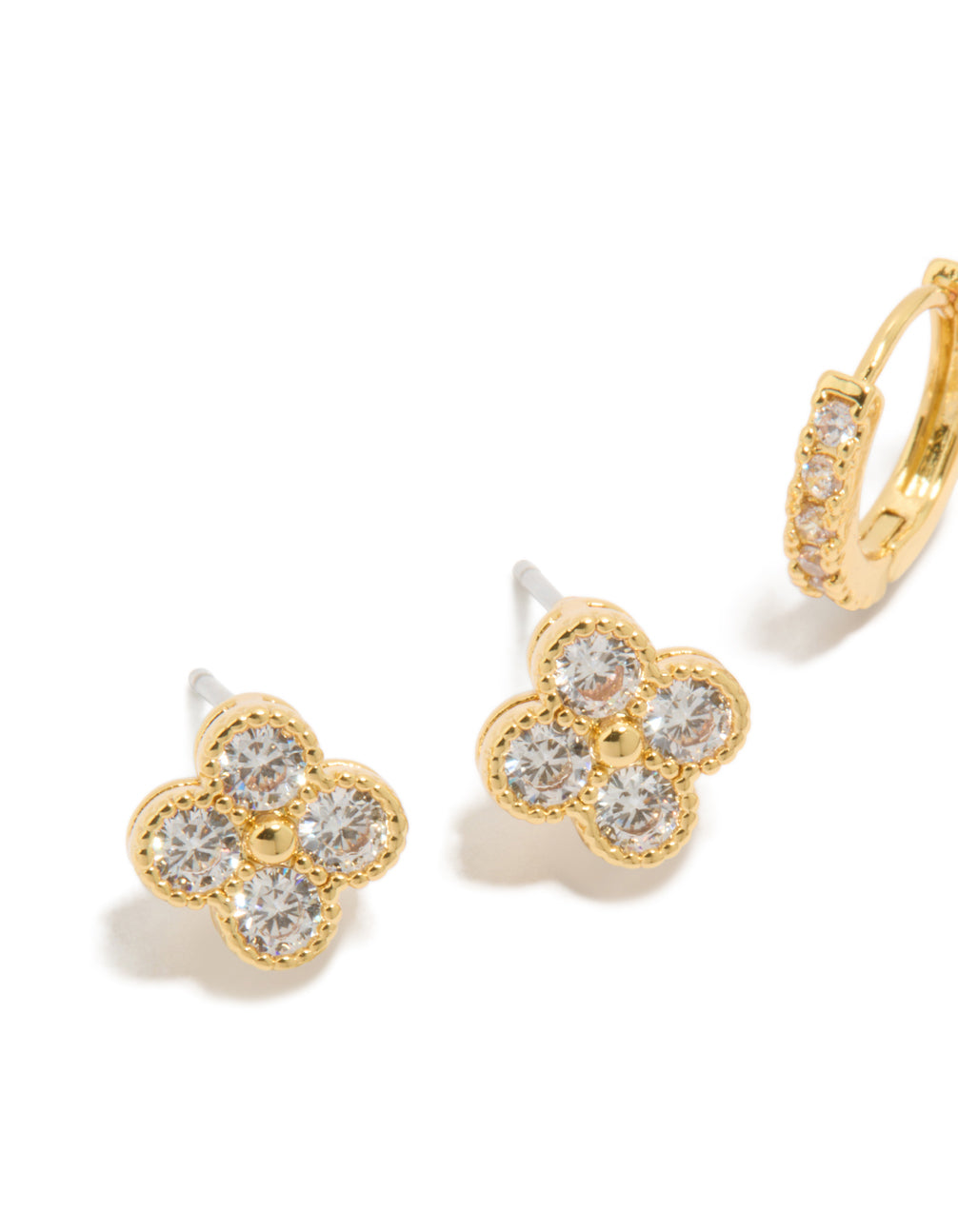 Designed with floral gold plated cubic zirconia huggie earrings in a 2-pack close up view