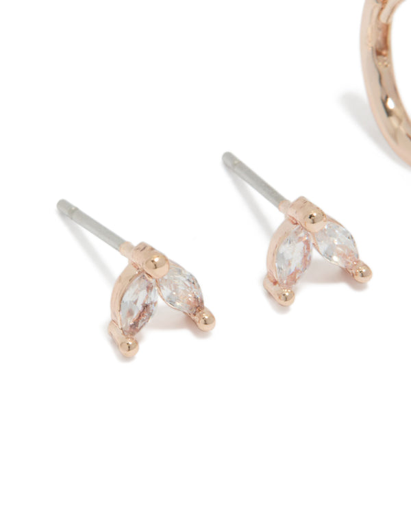 Featuring rose gold plated cubic zirconia stud and huggie earrings 2-pack with baguette stone cut close up view