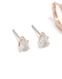 This elegant set showcases teardrop cubic zirconia stud earrings with rose gold plating in a close up view - link has visual effect only