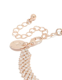 Designed with rose gold plated cubic zirconia diagonal tennis bracelet featuring round stone cut and charm closure detail view - link has visual effect only