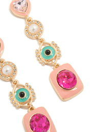 Featuring gold enamel celestial drop earrings with evil-eye, pearl, heart, hamsa hand and charm details in pink and turquoise, statement style close up view - link has visual effect only