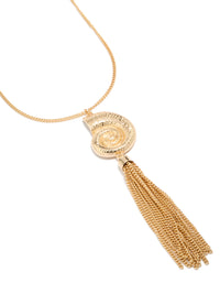 Beautifully crafted shell and tassel necklace in gold featuring ocean inspired design close up view - link has visual effect only