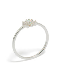 Beautifully crafted sterling silver cubic zirconia faux opal star ring with celestial design in white and ivory front view - link has visual effect only