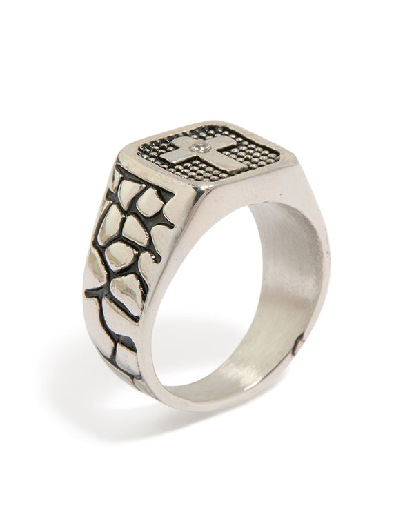 Featuring a mens waterproof stainless steel cross signet ring with etched details and cubic zirconia in silver with black accents side detail view