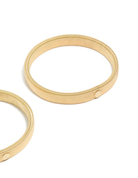 Highlighting gold stretch sleeve garters in a 2-pack side detail view - link has visual effect only